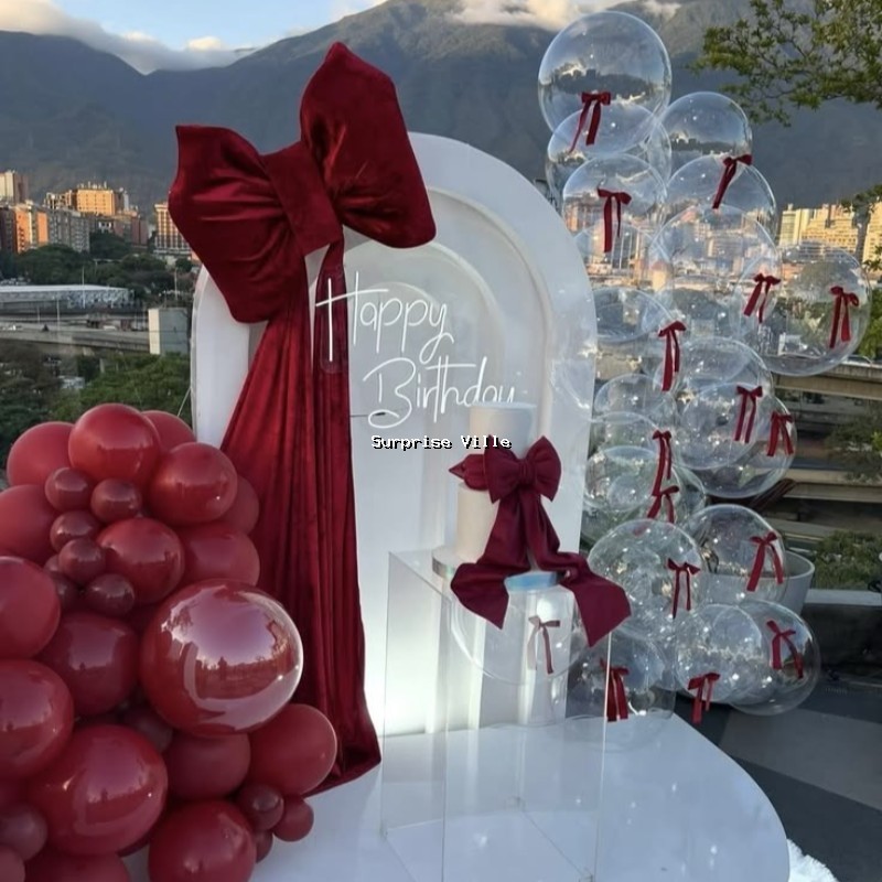 Elegant Red Bow Birthday Setup